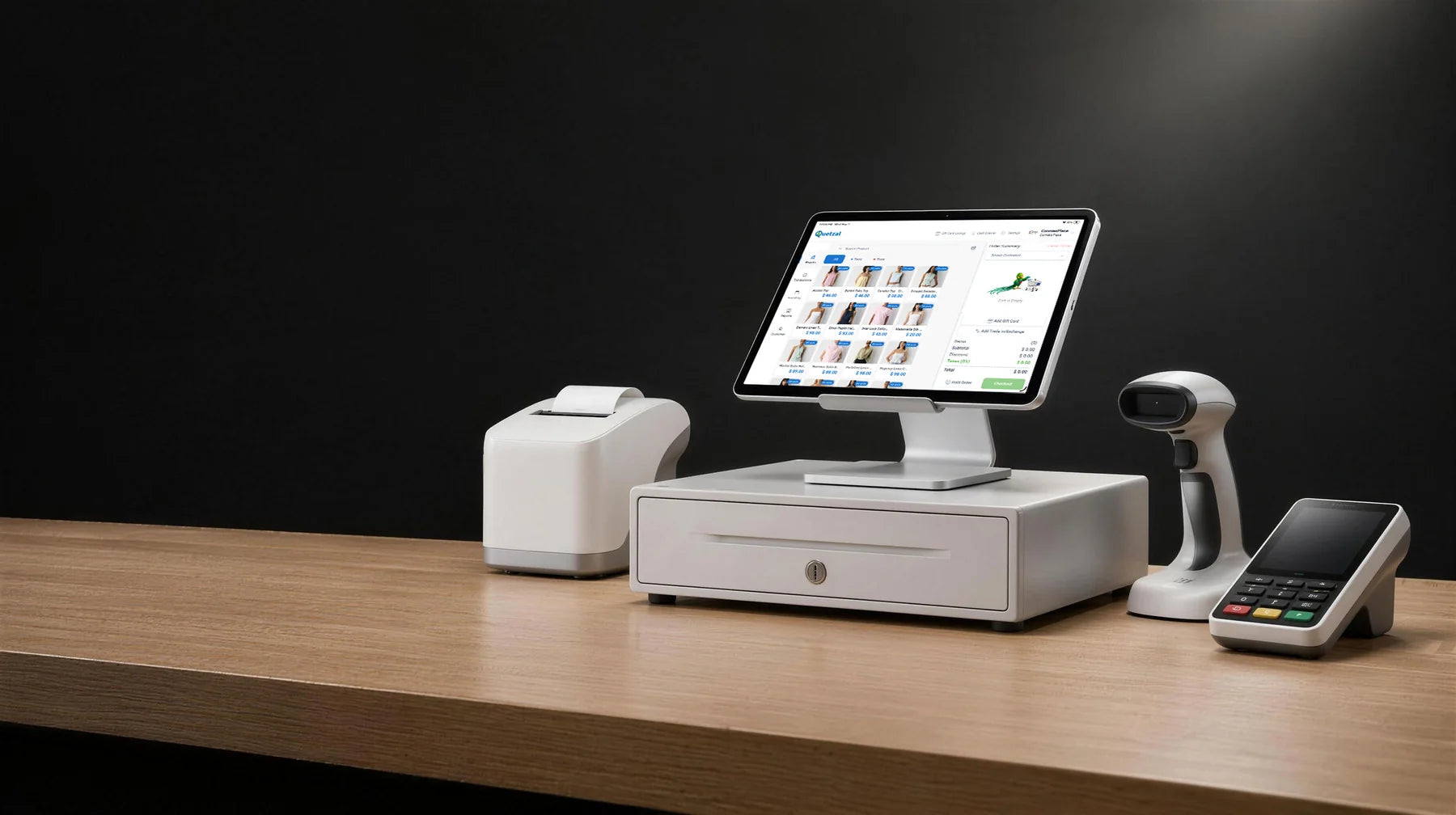 iPad showing the Quetzal POS register on a stand, with a receipt printer, cash drawer, barcode scanner and card terminal